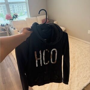 Hollister Black Hoodie with Metallic HCO Logo